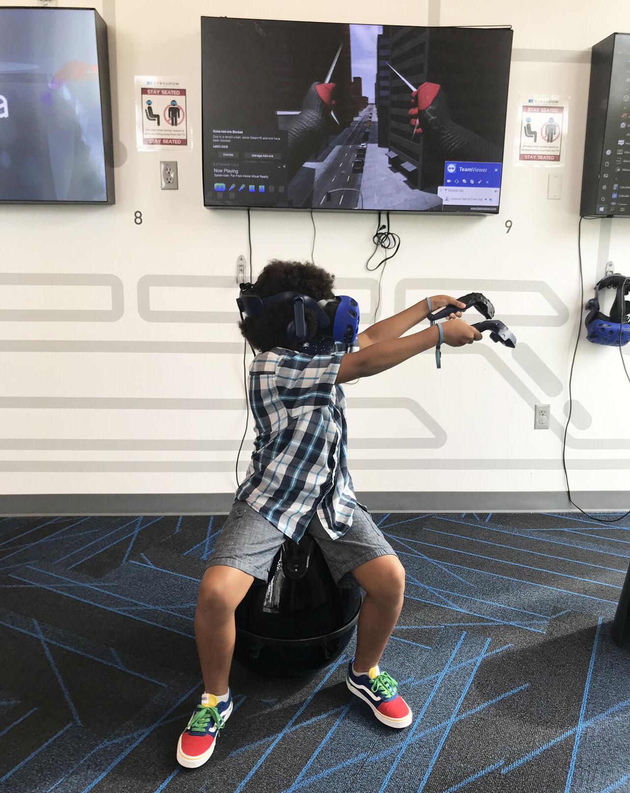 Nathaniel loved being “Spiderman” at the VR station.